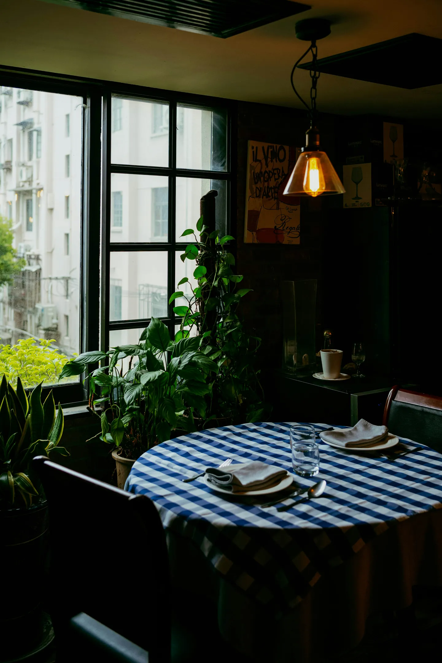 Restaurant table set beside a window